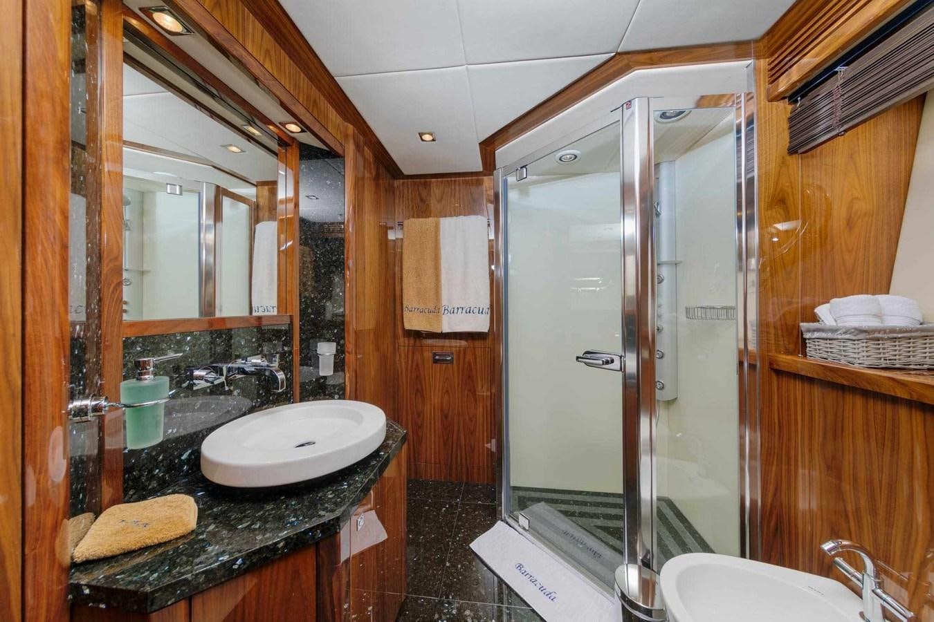 a bathroom with a shower and sink aboard BARRACUDA RED SEA Yacht for Sale