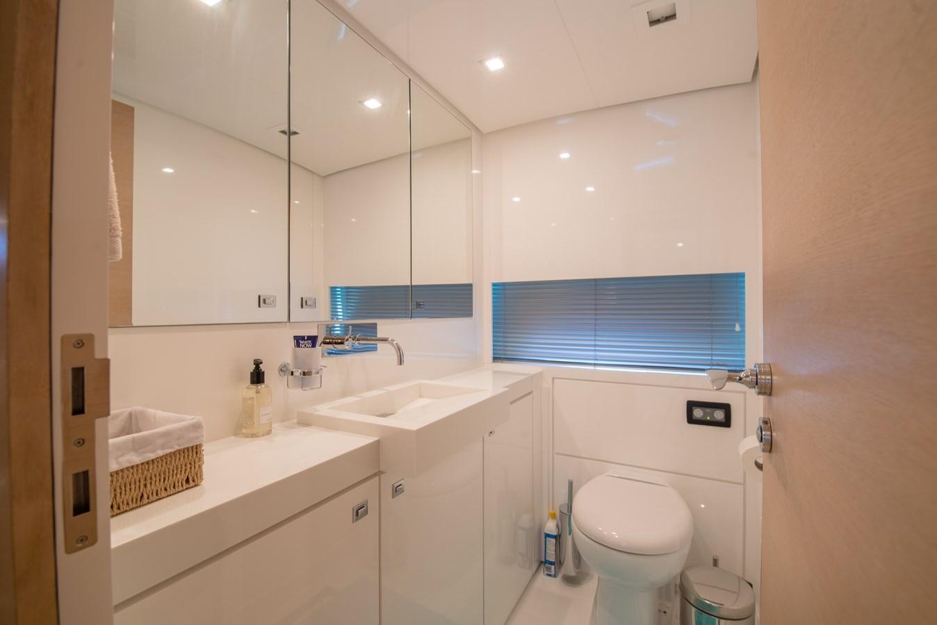 a bathroom with a sink and a toilet aboard SUN ANEMOS Yacht for Sale