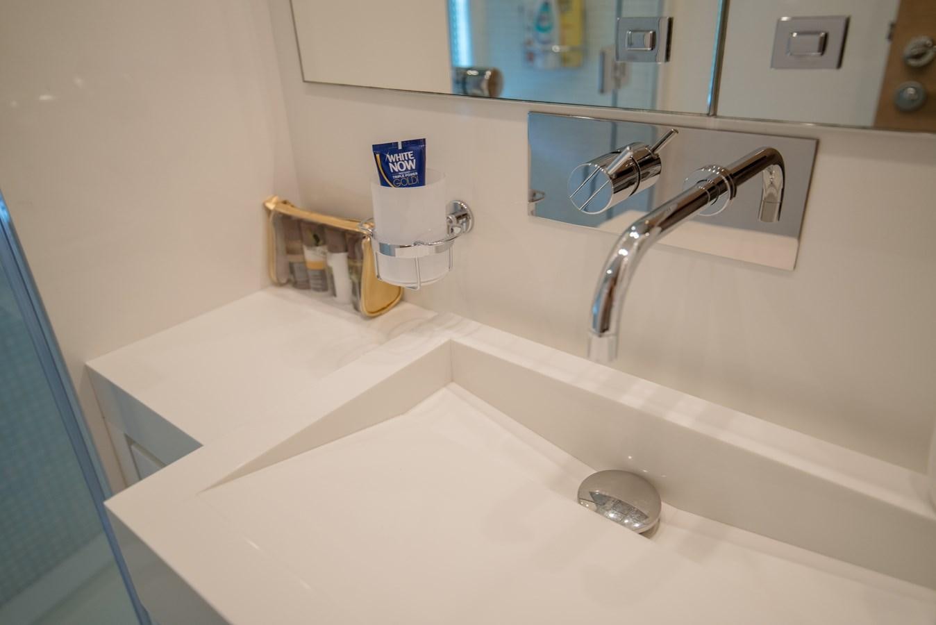 a bathroom sink with a faucet aboard SUN ANEMOS Yacht for Sale