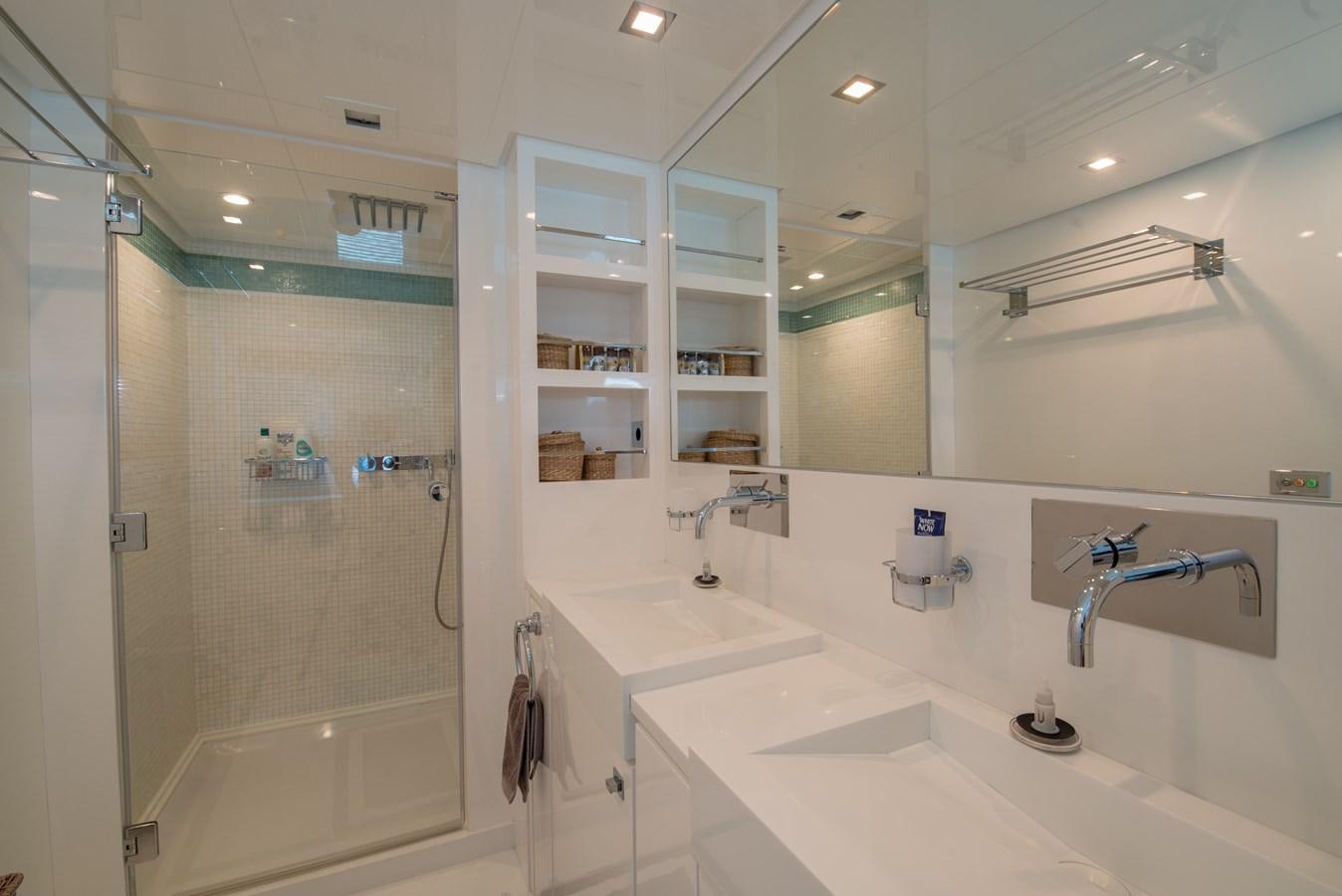 a bathroom with a glass shower aboard SUN ANEMOS Yacht for Sale