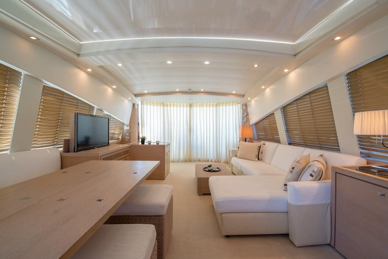a living room with a large window aboard SUN ANEMOS Yacht for Sale