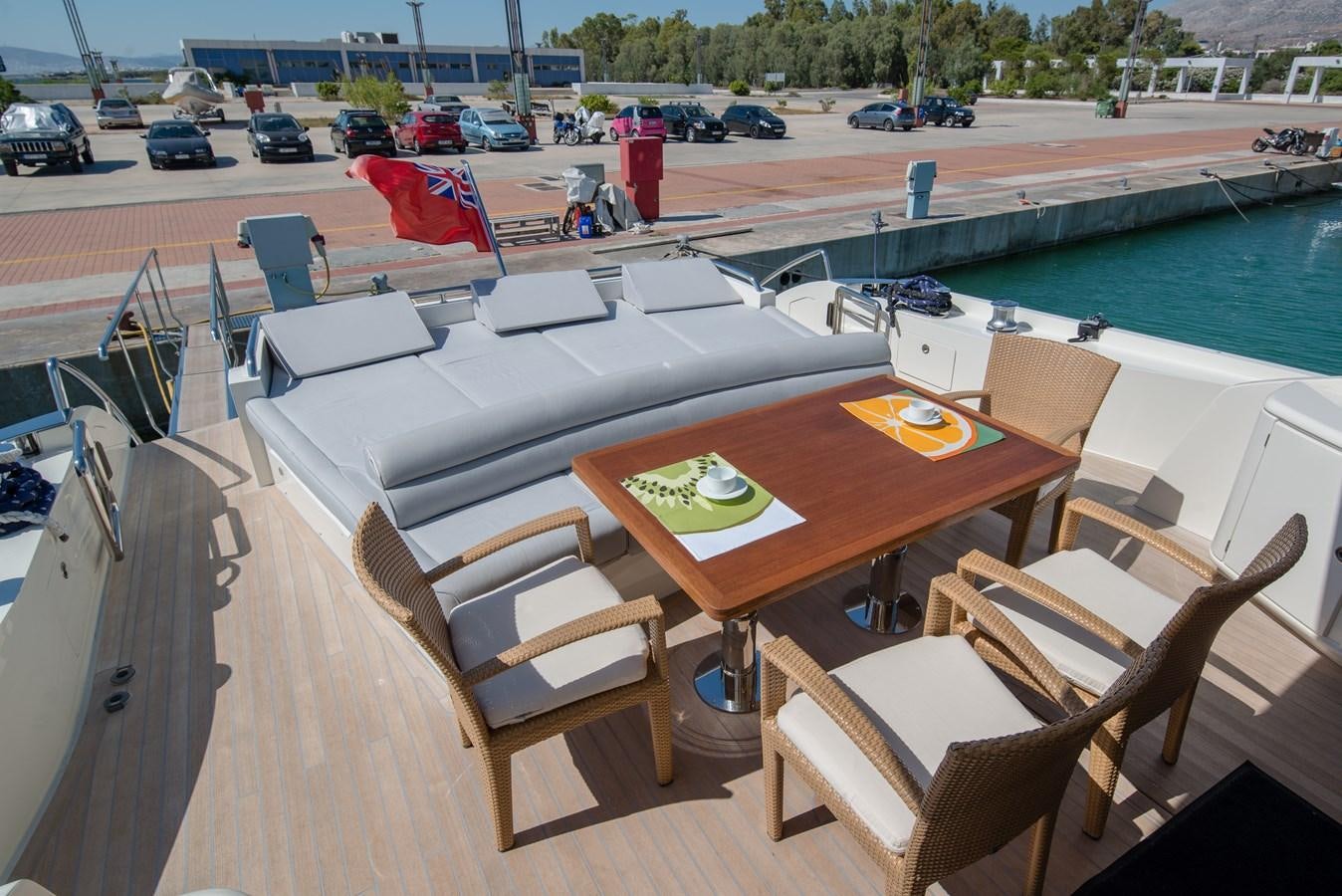 a table with chairs around it aboard SUN ANEMOS Yacht for Sale