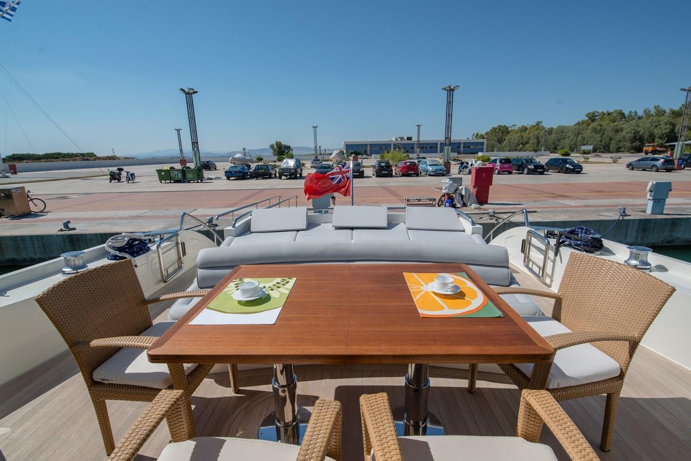 a table with chairs on it aboard SUN ANEMOS Yacht for Sale