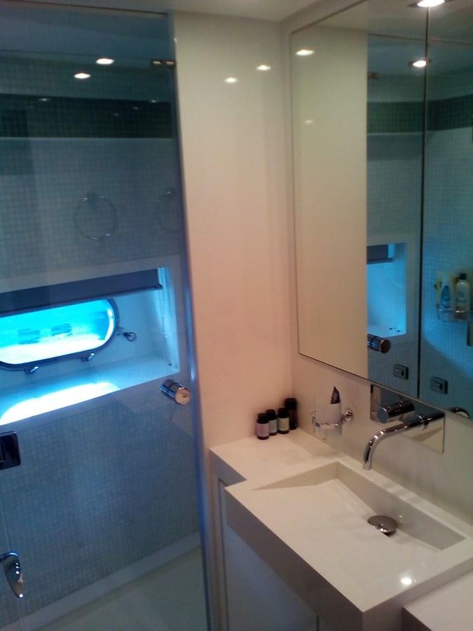 a bathroom with a large mirror aboard SUN ANEMOS Yacht for Sale