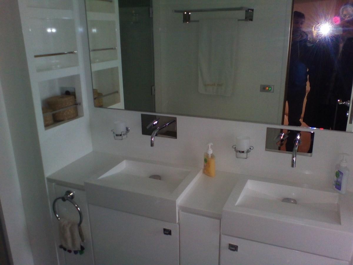 a bathroom with sinks and mirrors aboard SUN ANEMOS Yacht for Sale