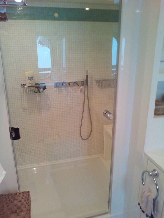 a shower with a glass door aboard SUN ANEMOS Yacht for Sale
