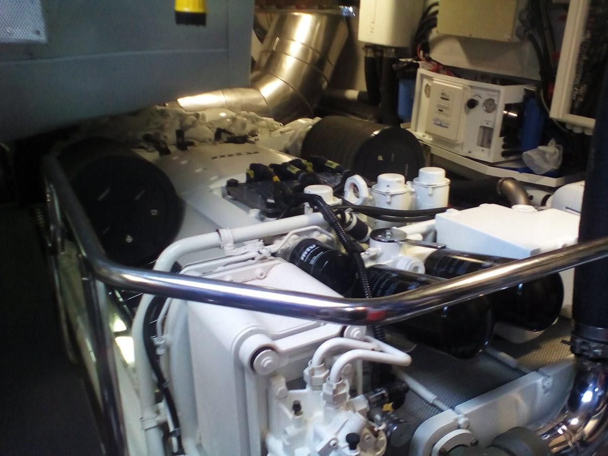 a car with a large engine aboard SUN ANEMOS Yacht for Sale