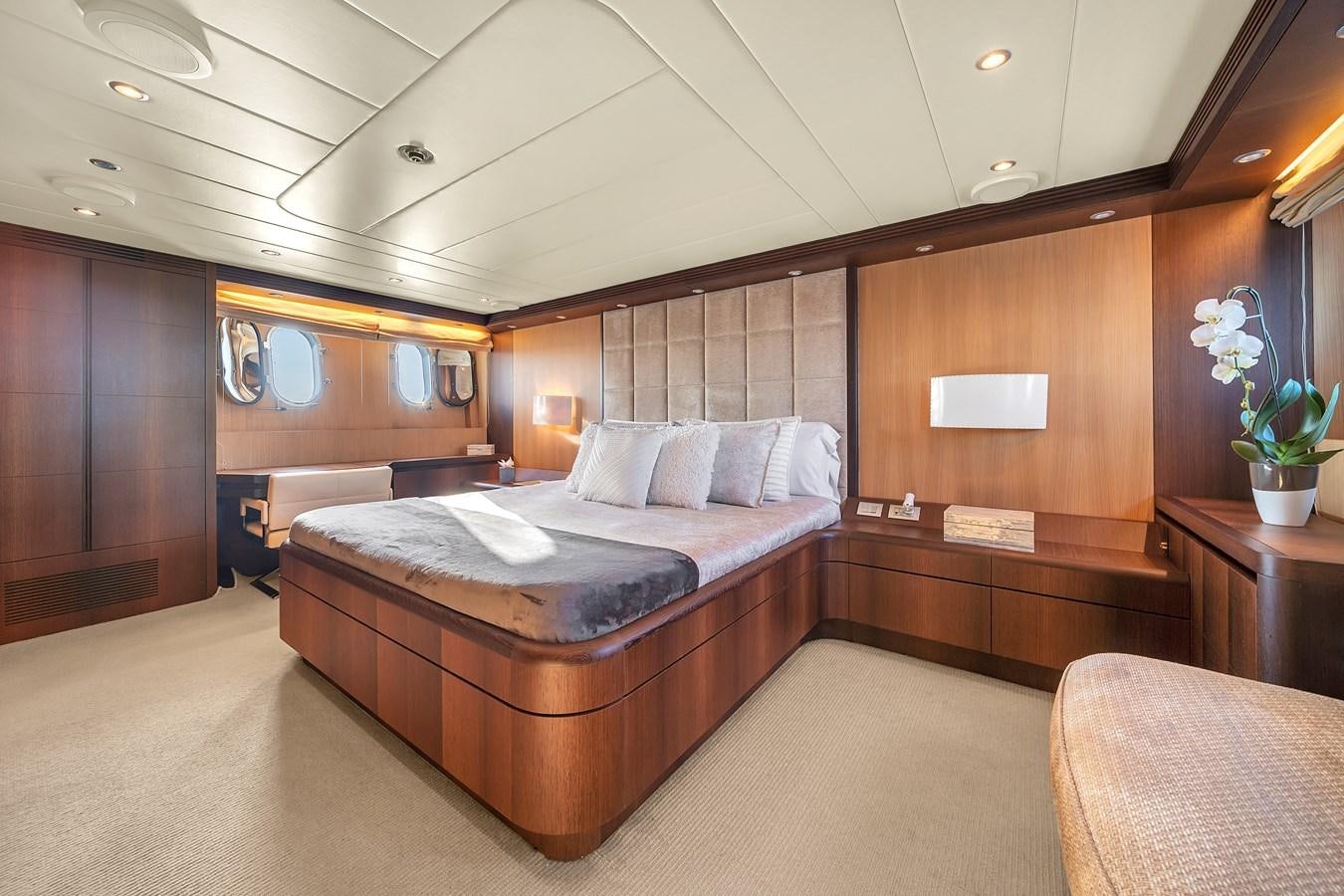 a large bed in a room aboard DOMINIC Yacht for Sale