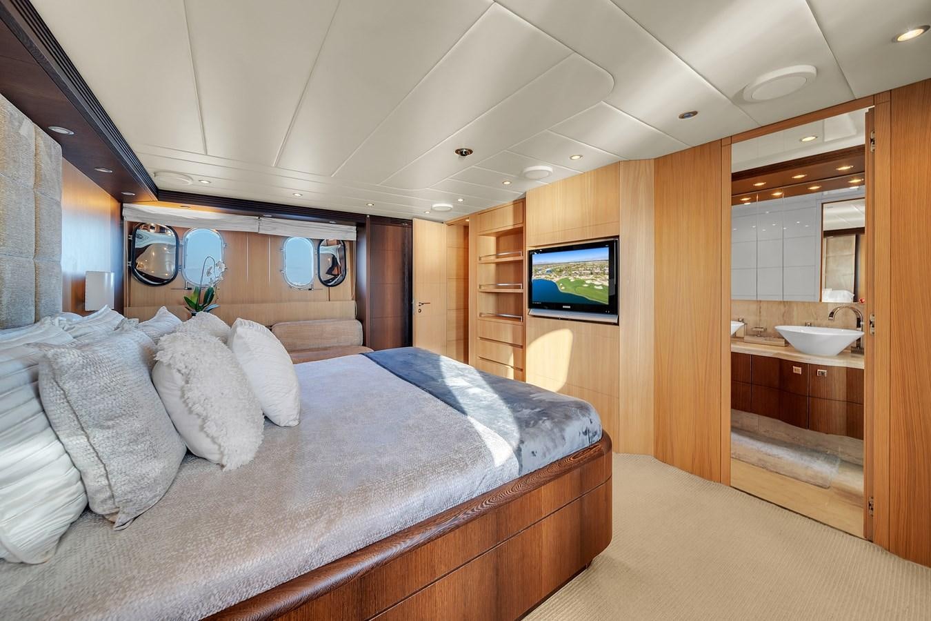 a bed in a room aboard DOMINIC Yacht for Sale