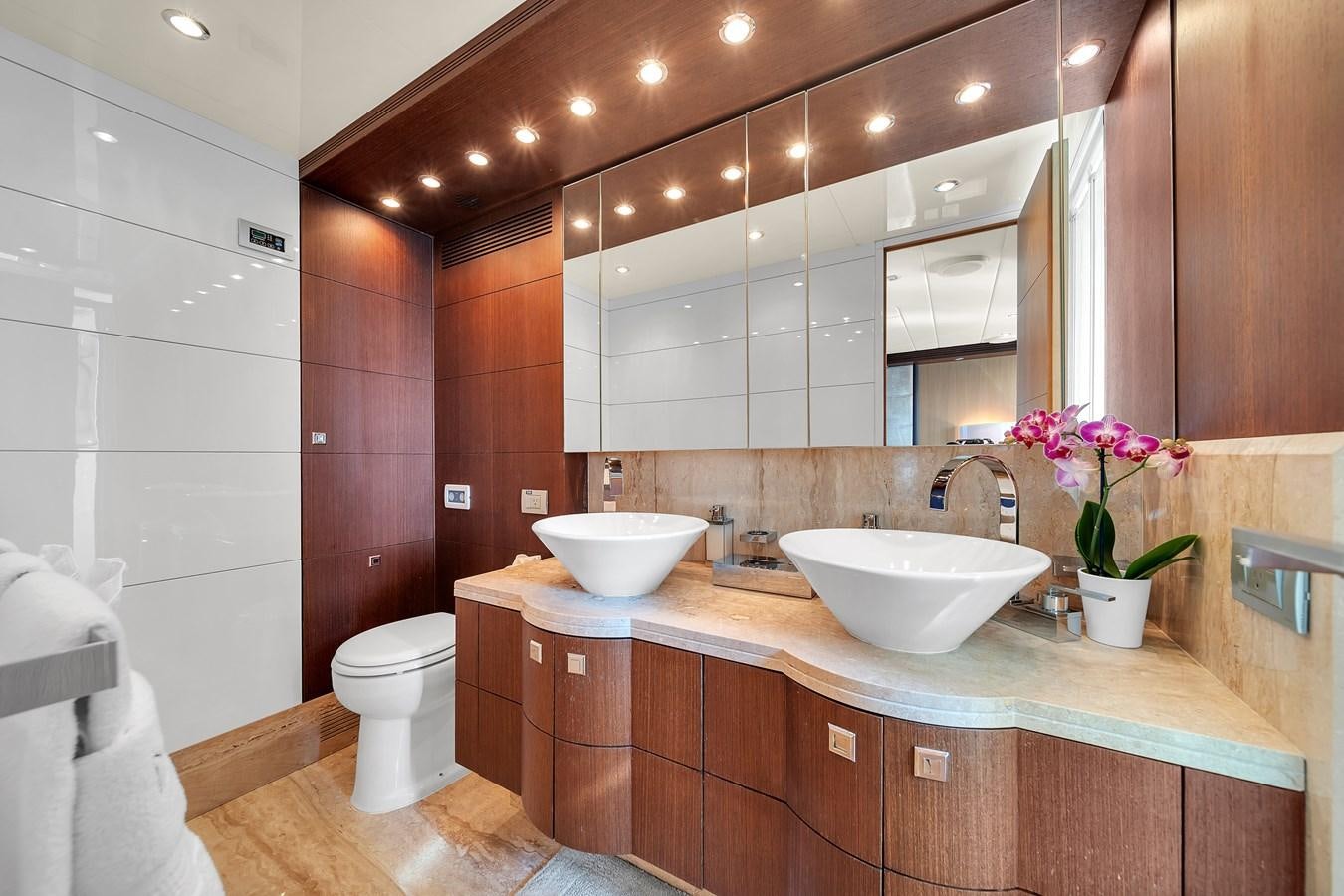 a bathroom with a sink and a toilet aboard DOMINIC Yacht for Sale