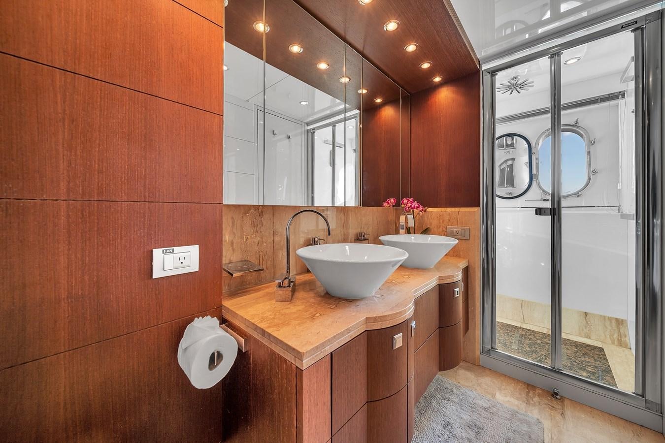 a bathroom with a sink and a shower unit aboard DOMINIC Yacht for Sale