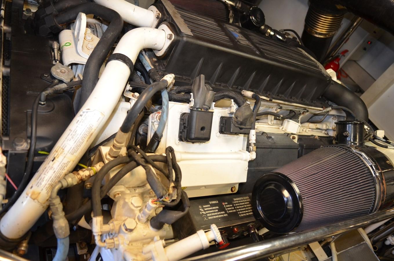 a close-up of a car engine aboard DOMINIC Yacht for Sale