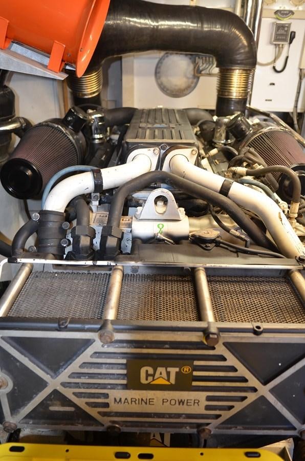 a close-up of a car engine aboard DOMINIC Yacht for Sale
