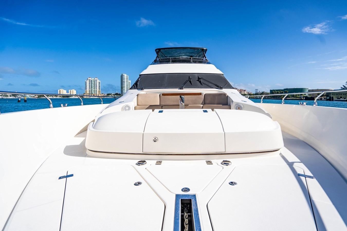 a white car on a snowy runway aboard MAYA Yacht for Sale
