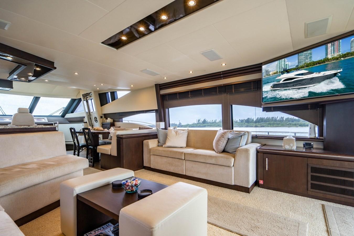 a living room with a large window aboard MAYA Yacht for Sale