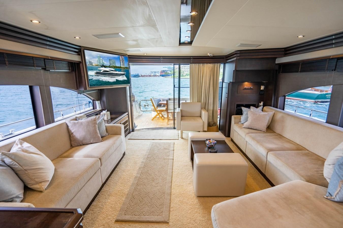 a living room with a large window aboard MAYA Yacht for Sale