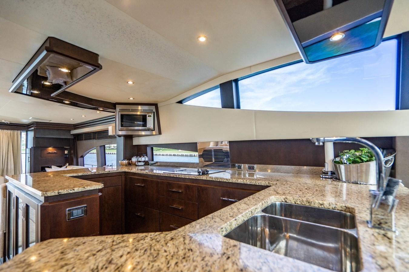 a kitchen with a large countertop aboard MAYA Yacht for Sale