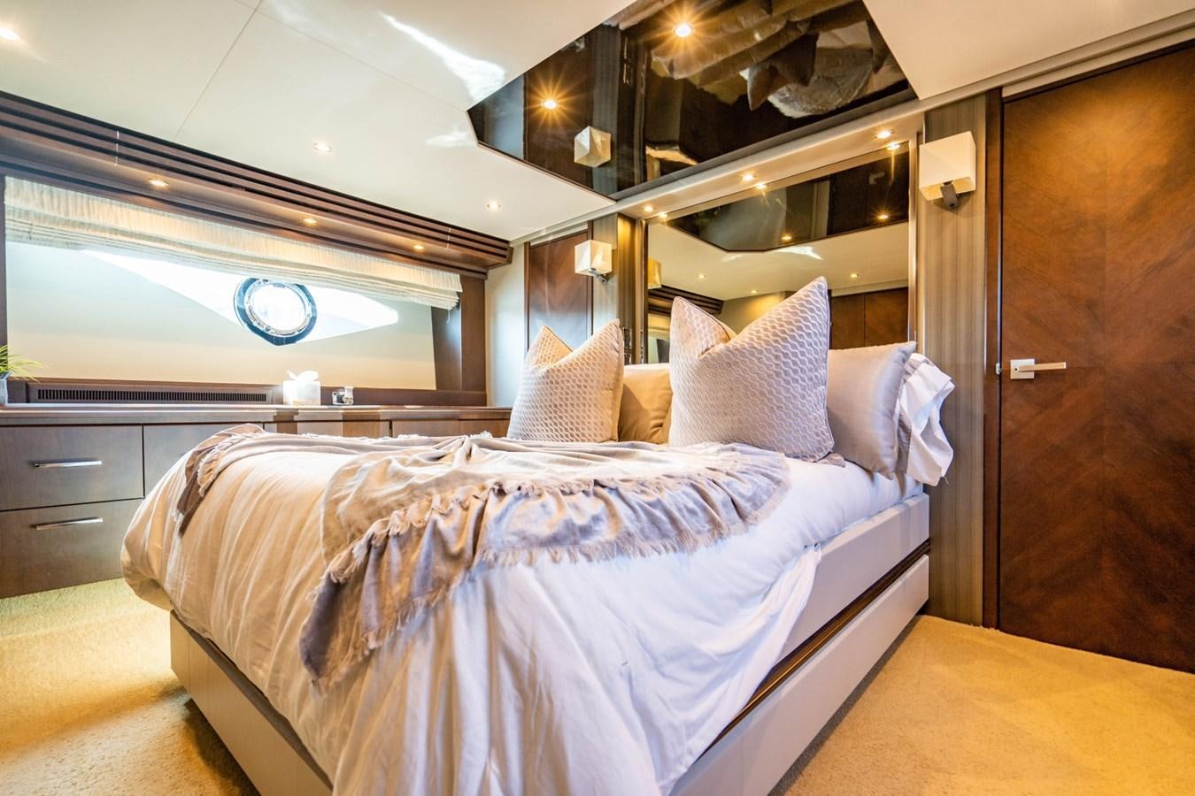 a bed in a room aboard MAYA Yacht for Sale
