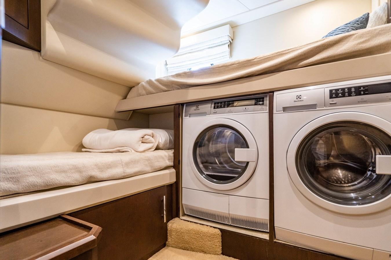 a white washing machine aboard MAYA Yacht for Sale
