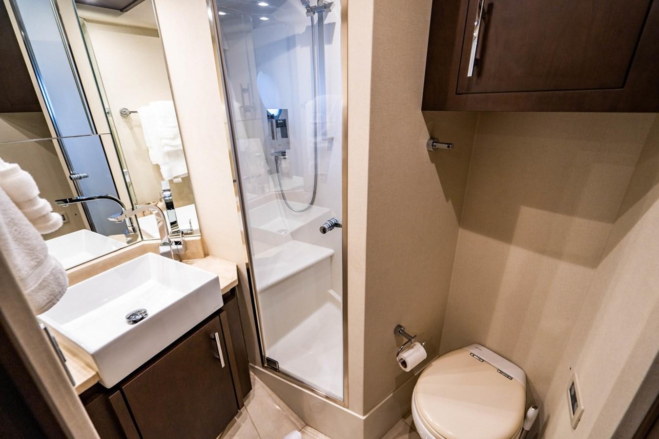 a bathroom with a sink and a toilet aboard MAYA Yacht for Sale