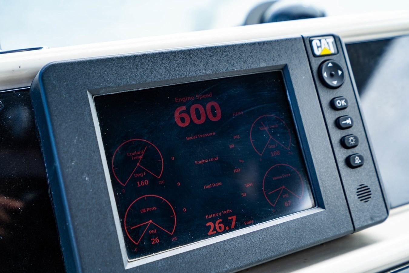 a close up of a digital clock aboard MAYA Yacht for Sale