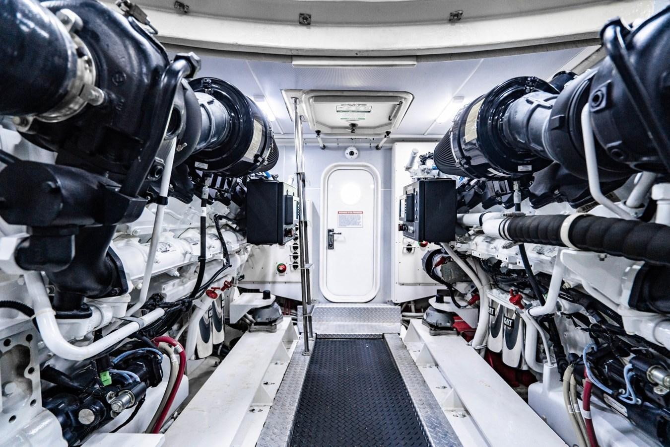 a room with many pipes and wires aboard MAYA Yacht for Sale