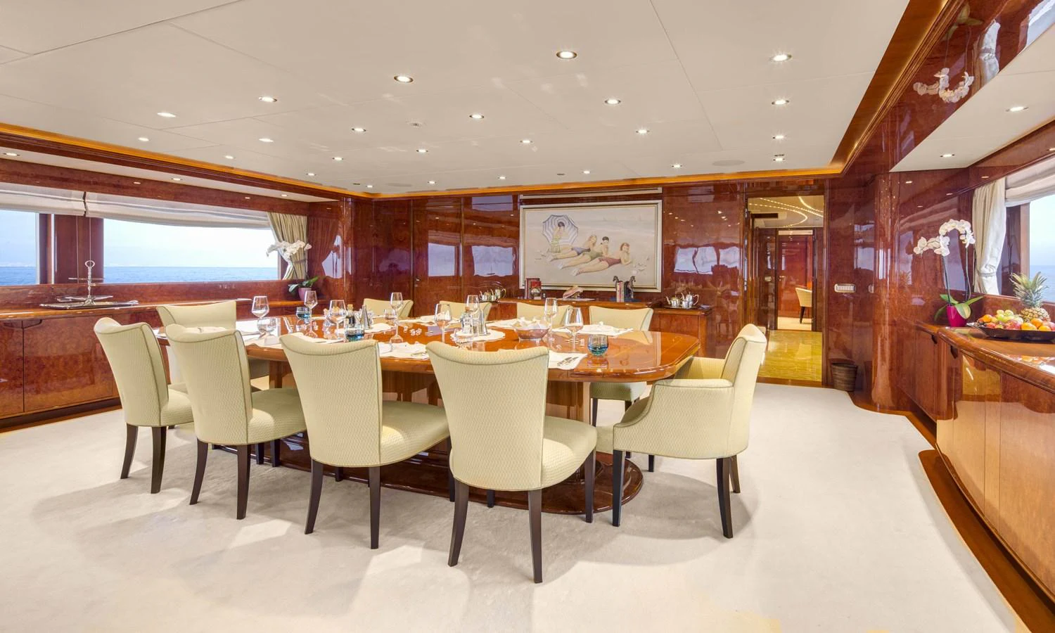 a large room with tables and chairs aboard BARON TRENCK Yacht for Charter