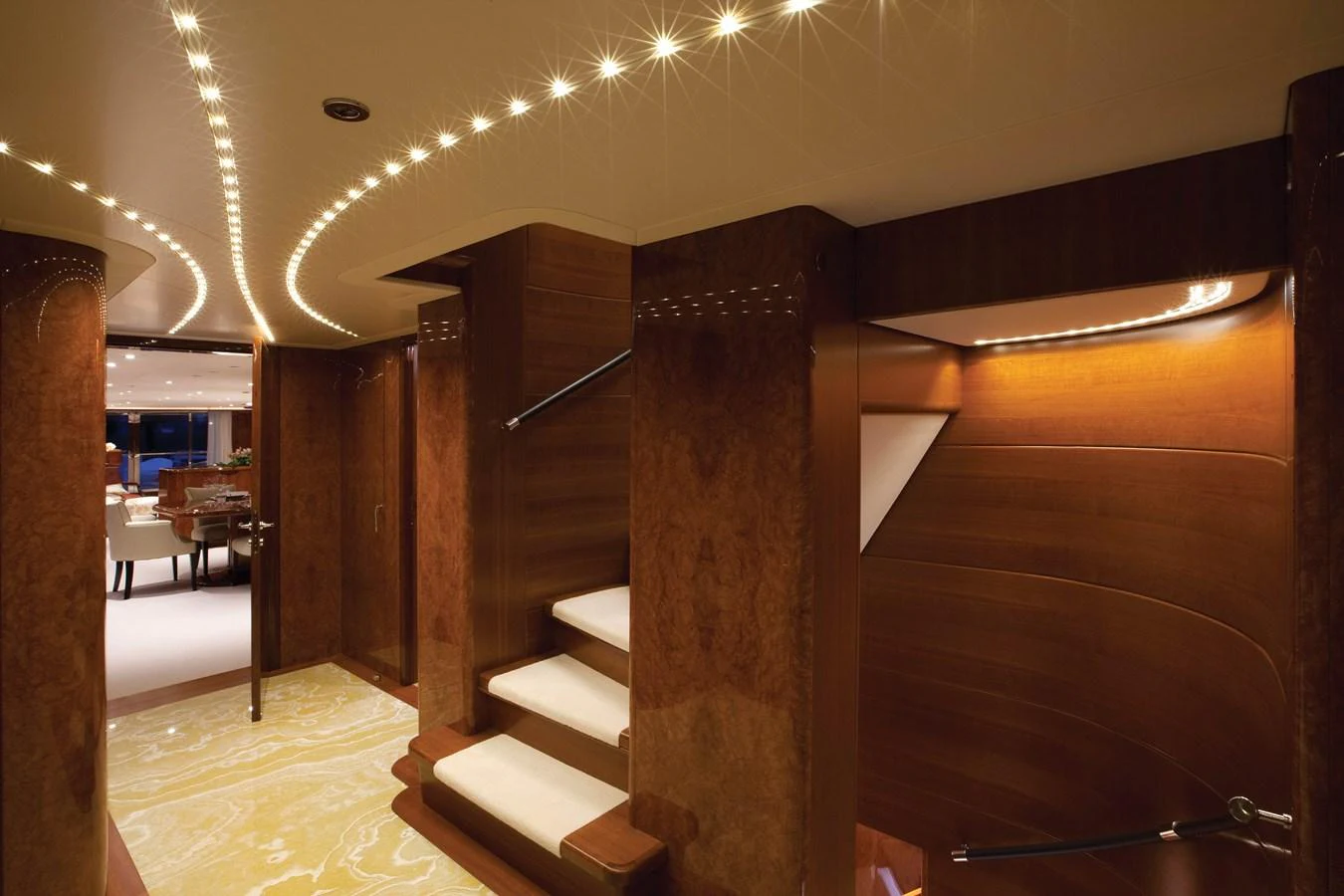 a room with wooden furniture aboard BARON TRENCK Yacht for Charter