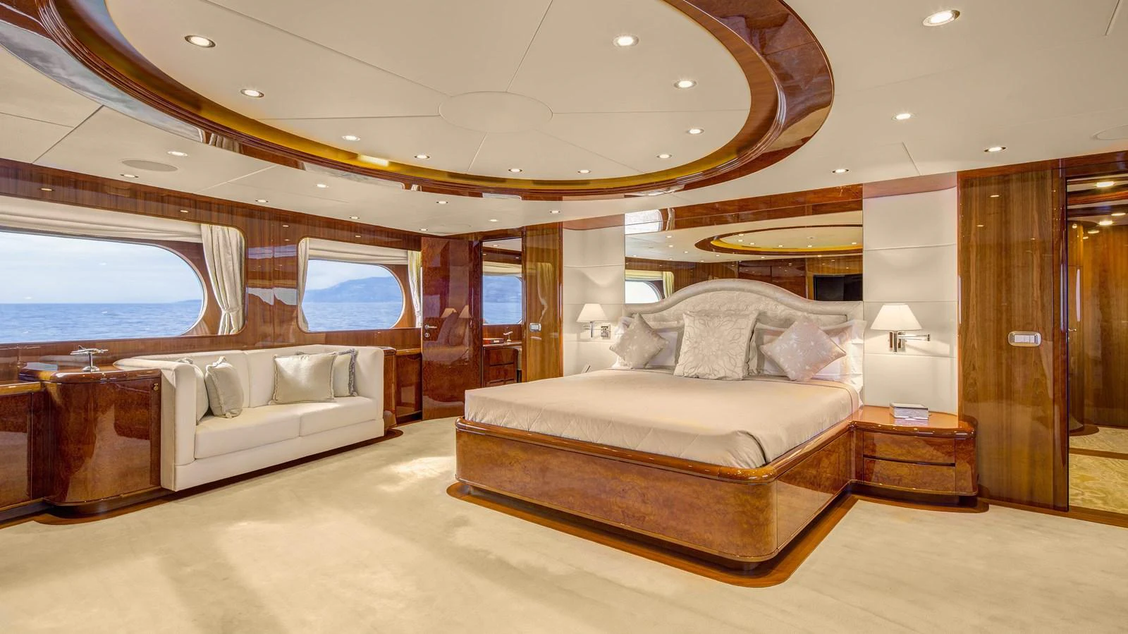 a large bedroom with a large bed aboard BARON TRENCK Yacht for Charter
