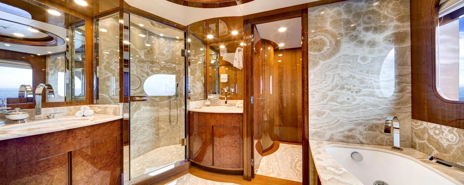 a bathroom with a glass shower aboard BARON TRENCK Yacht for Charter