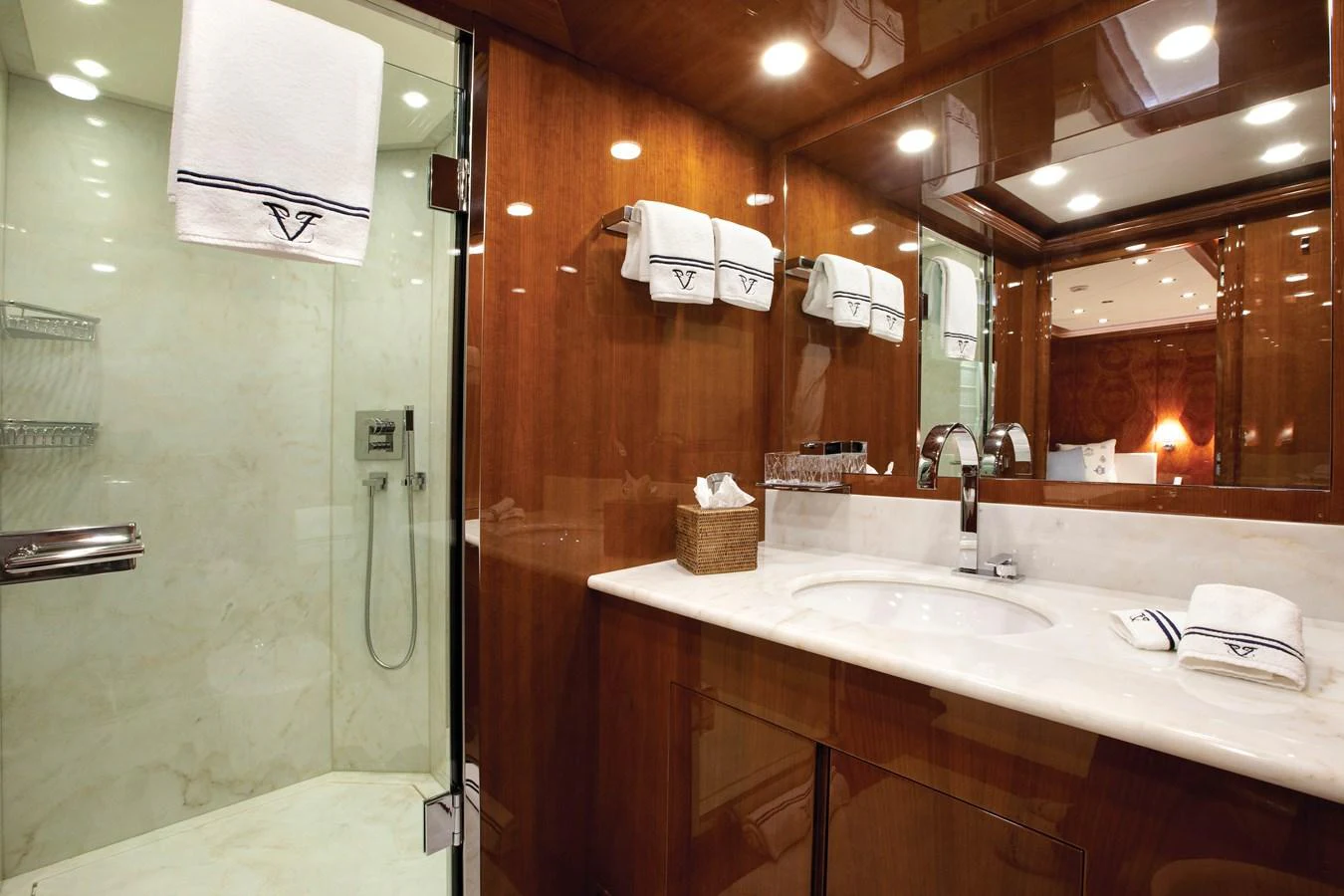 a bathroom with a sink and a mirror aboard BARON TRENCK Yacht for Charter