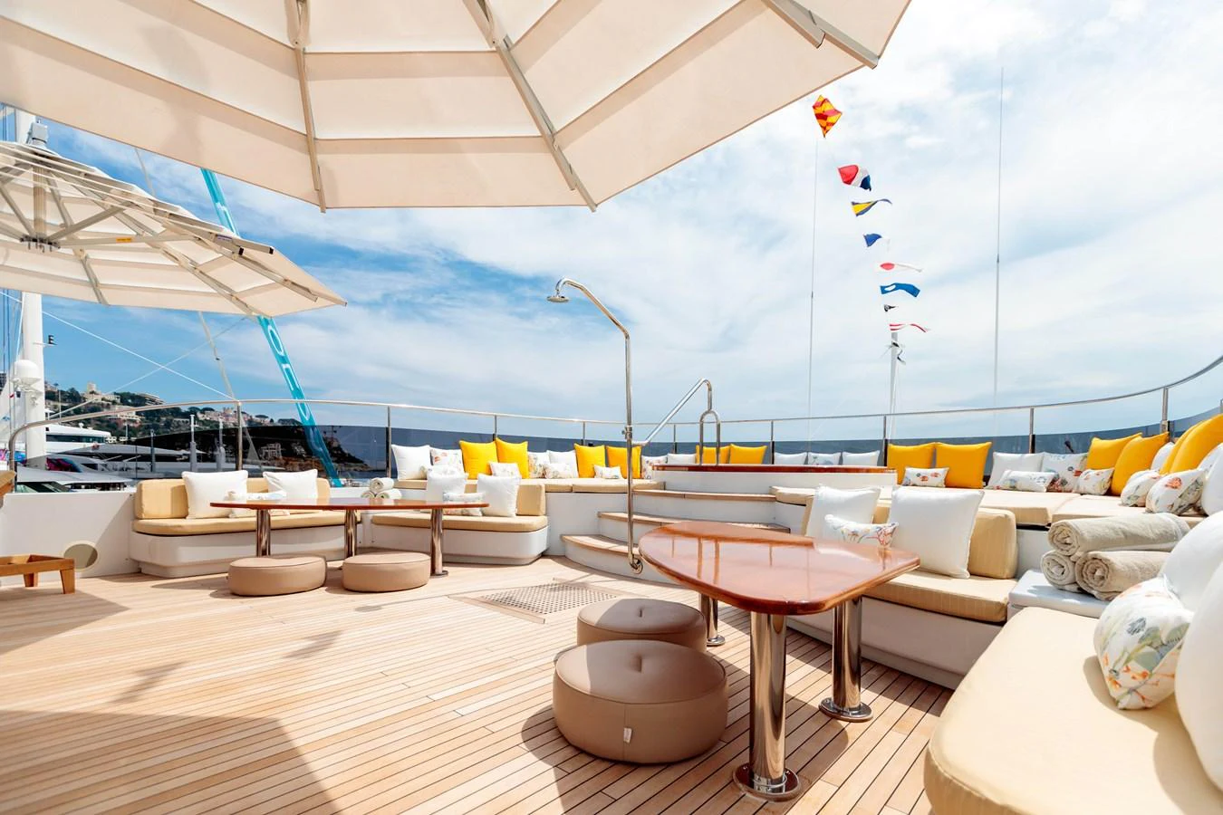 a room with tables and chairs aboard BARON TRENCK Yacht for Charter