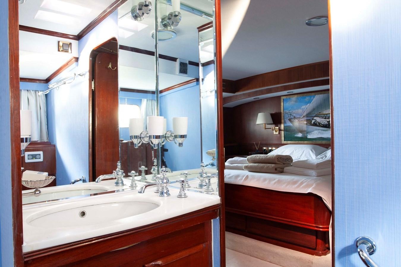 a bathroom with a large mirror aboard LAMADINE Yacht for Sale
