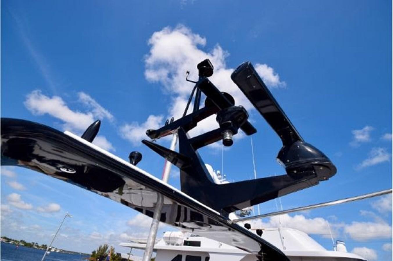 a large propeller plane aboard MAC LL Yacht for Sale