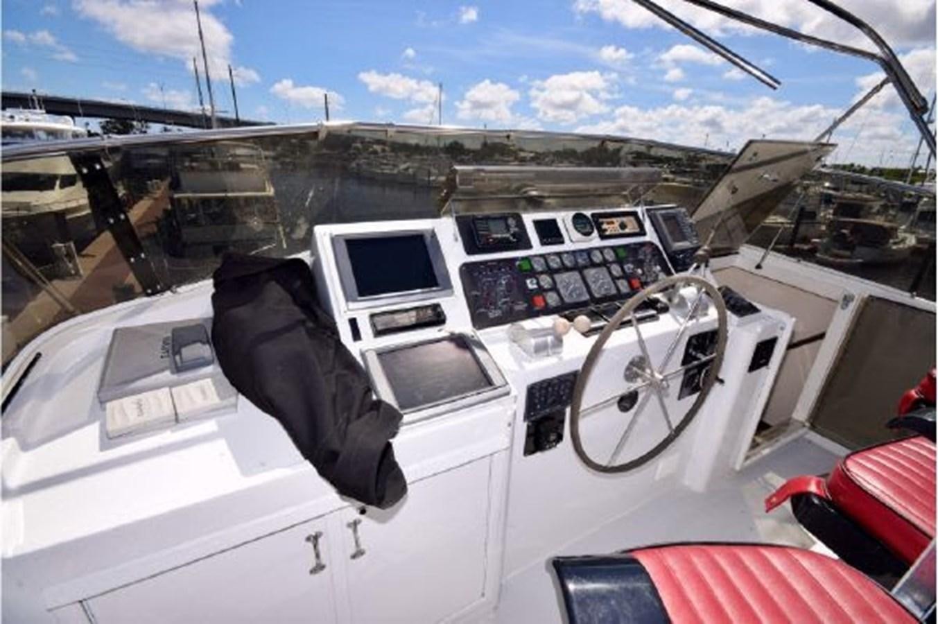 the inside of a helicopter aboard MAC LL Yacht for Sale