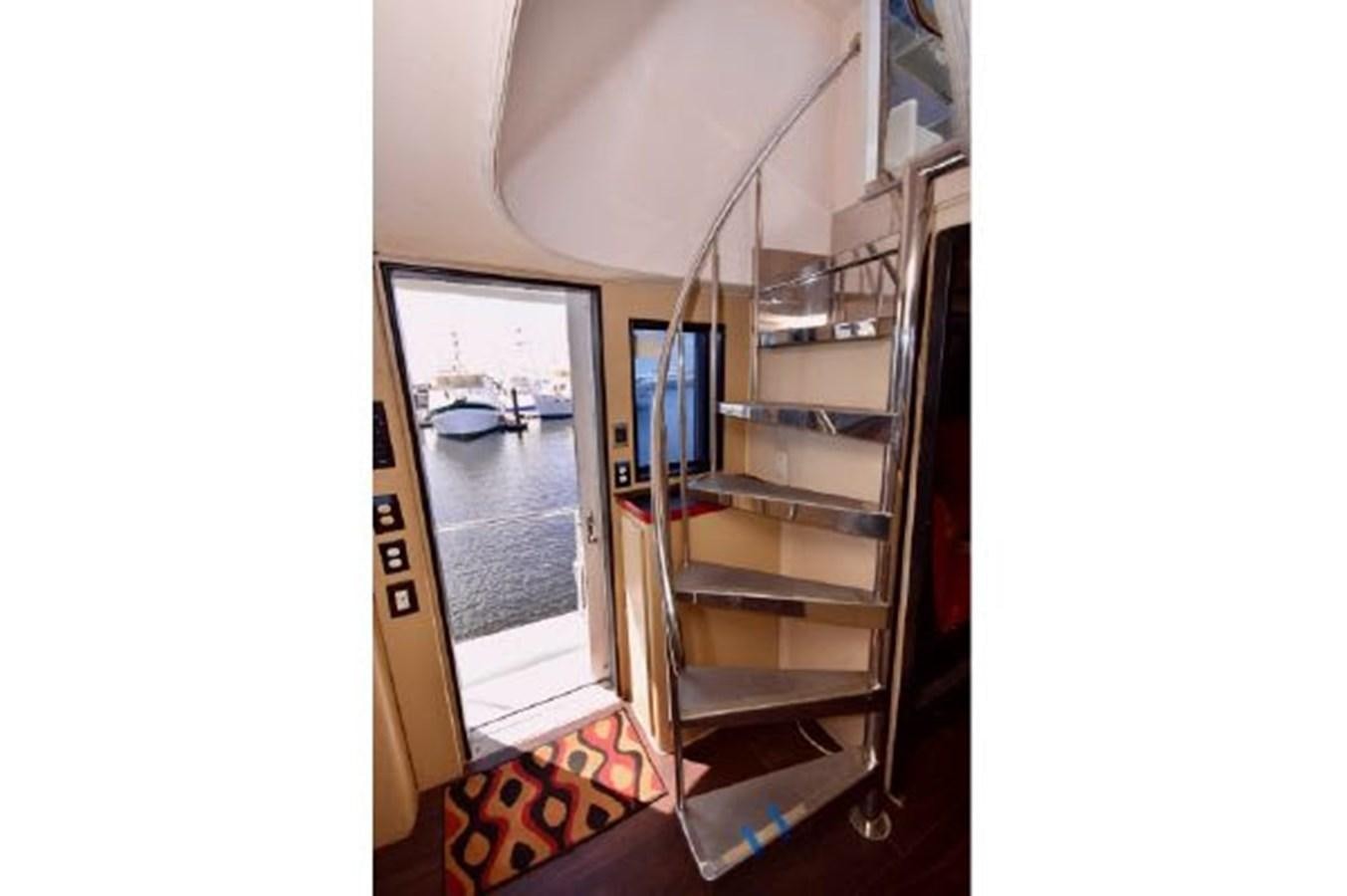 a room with a glass door aboard MAC LL Yacht for Sale