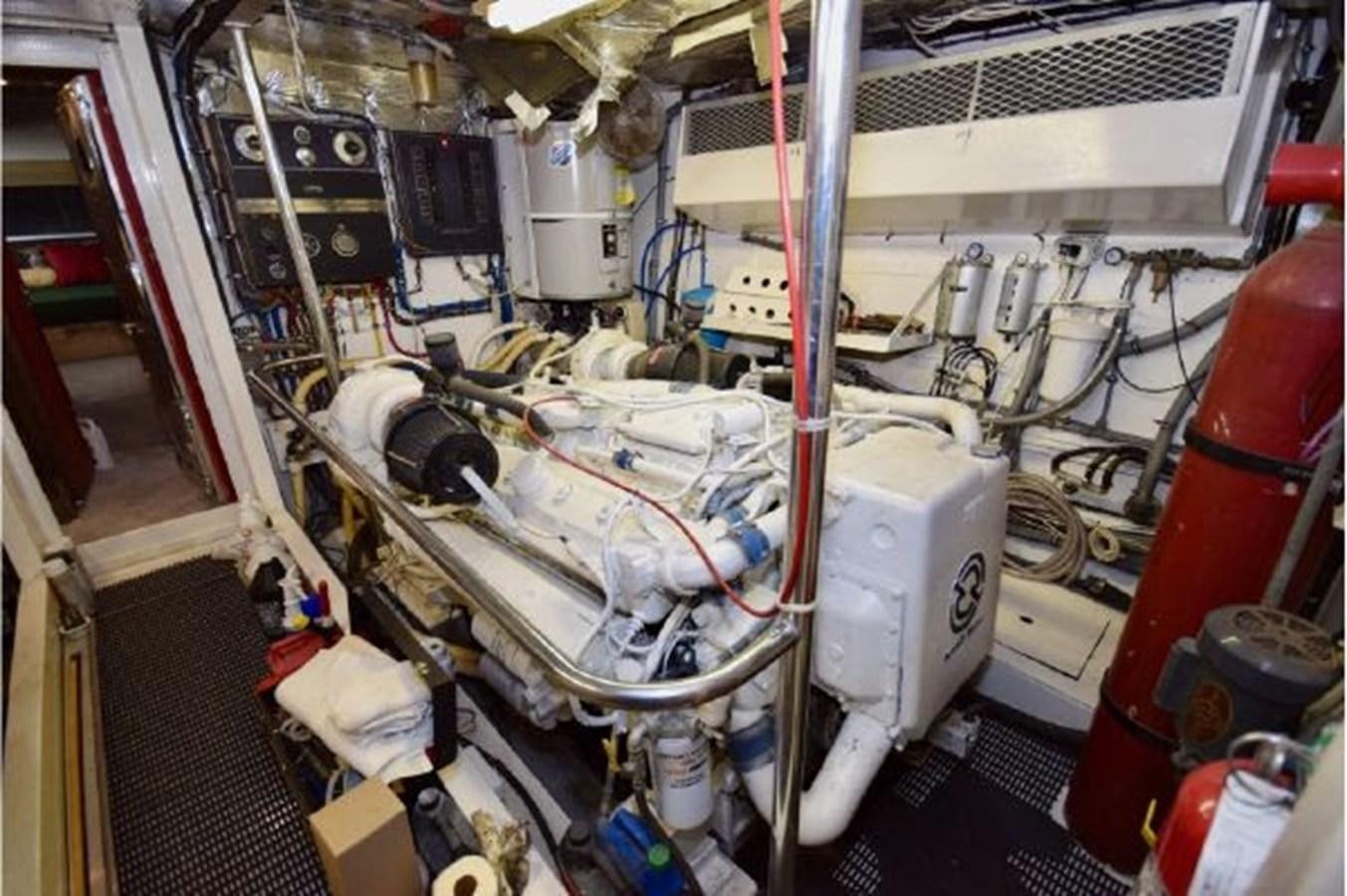 a large machine in a room aboard MAC LL Yacht for Sale