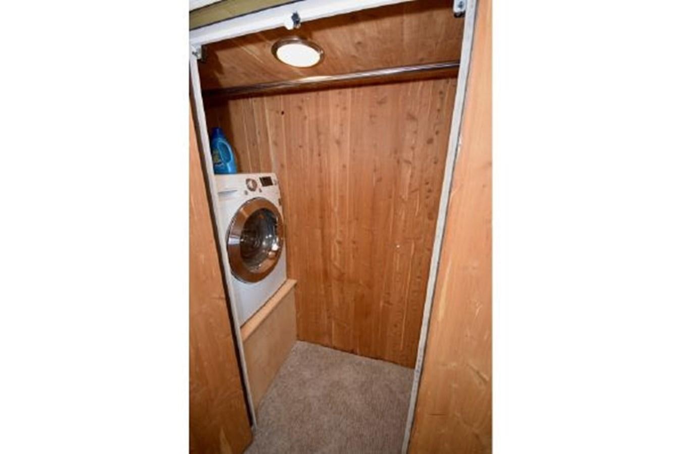 a small washer and dryer aboard MAC LL Yacht for Sale