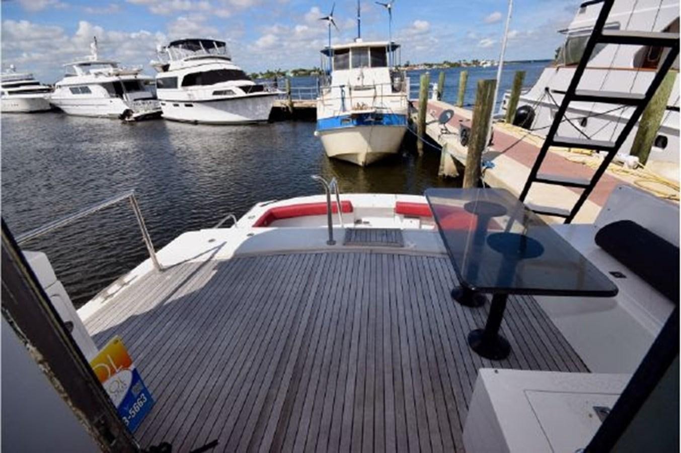 a group of boats are parked on a dock aboard MAC LL Yacht for Sale