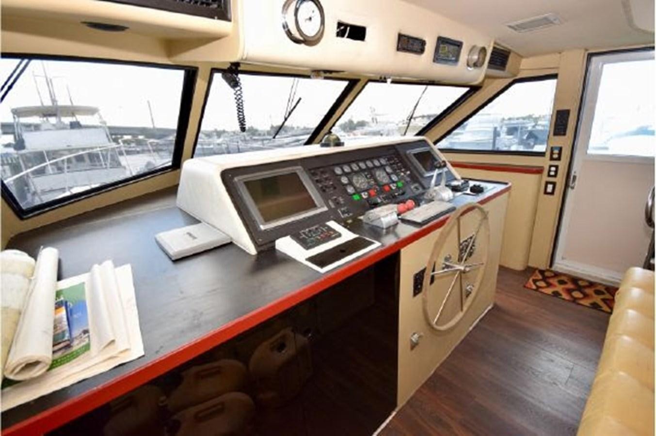 a room with a desk and a computer aboard MAC LL Yacht for Sale