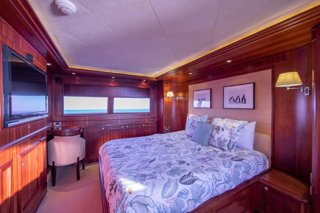 a bed in a room aboard BIM Yacht for Sale