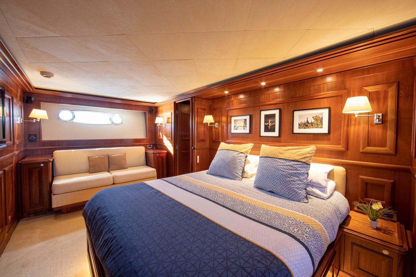 a bed in a room aboard BIM Yacht for Sale