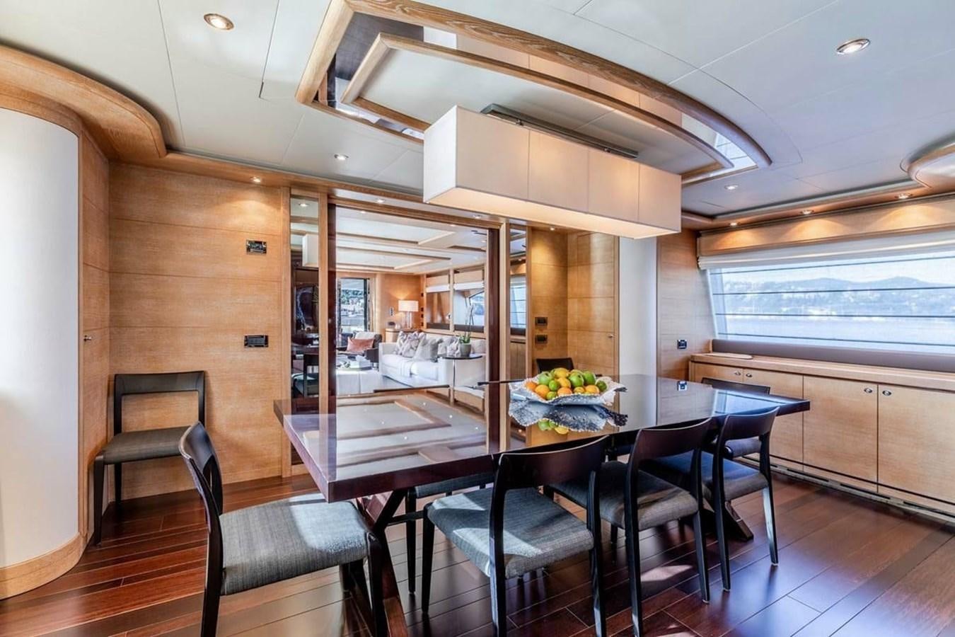 a kitchen and dining area aboard AERO Yacht for Sale