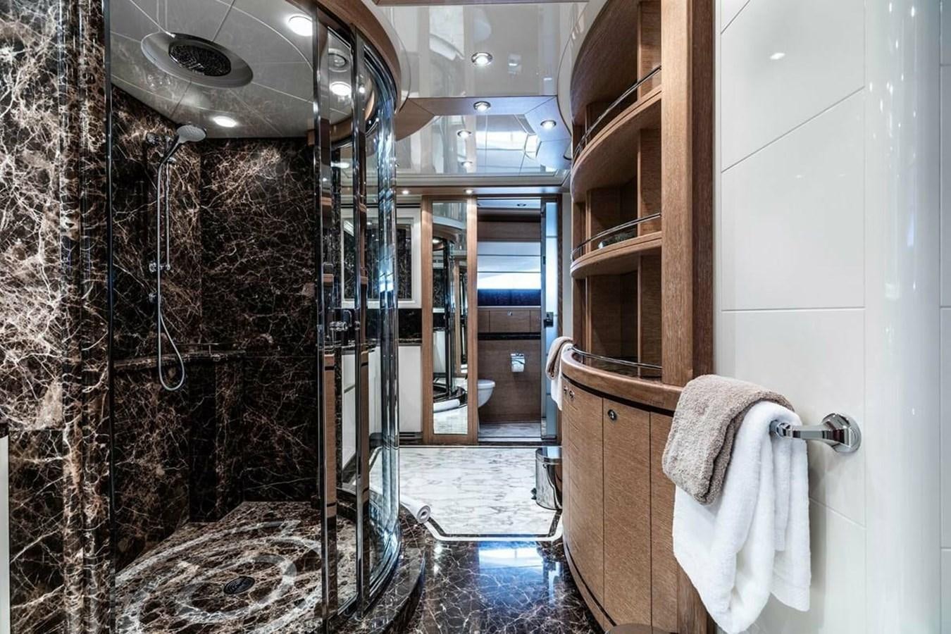 a bathroom with a shower and sink aboard AERO Yacht for Sale