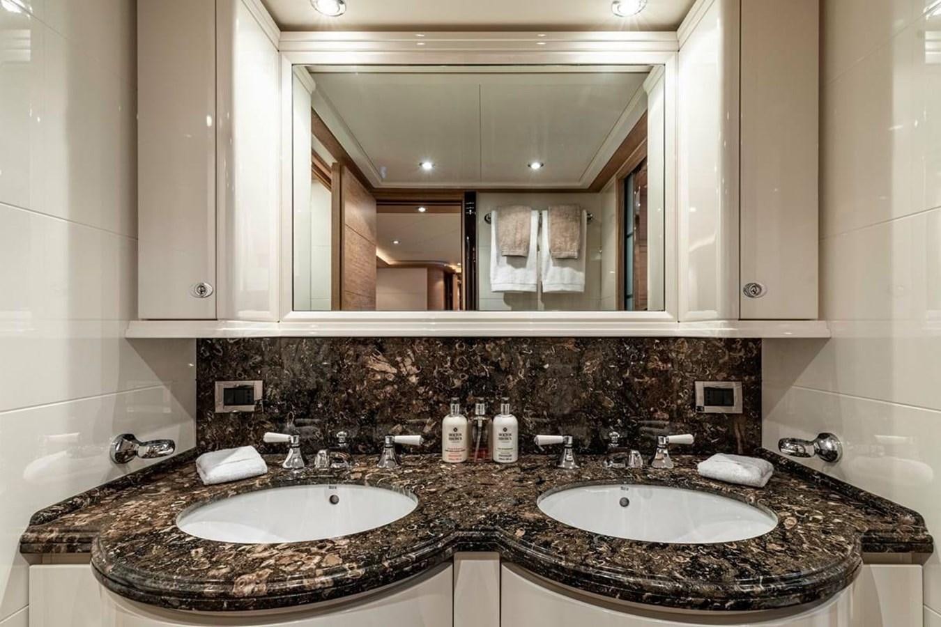 a bathroom with two sinks aboard AERO Yacht for Sale