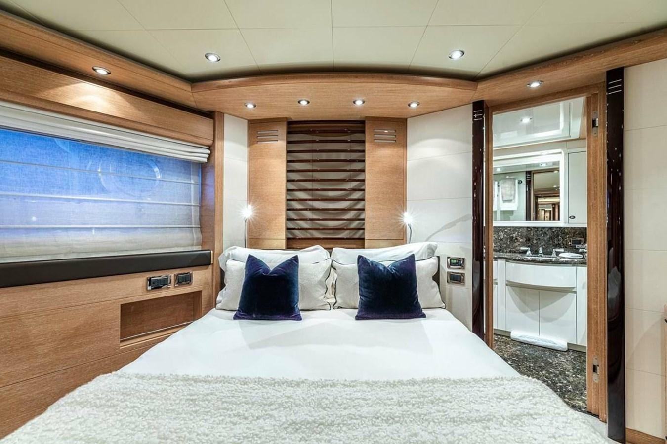 a bed in a hotel room aboard AERO Yacht for Sale