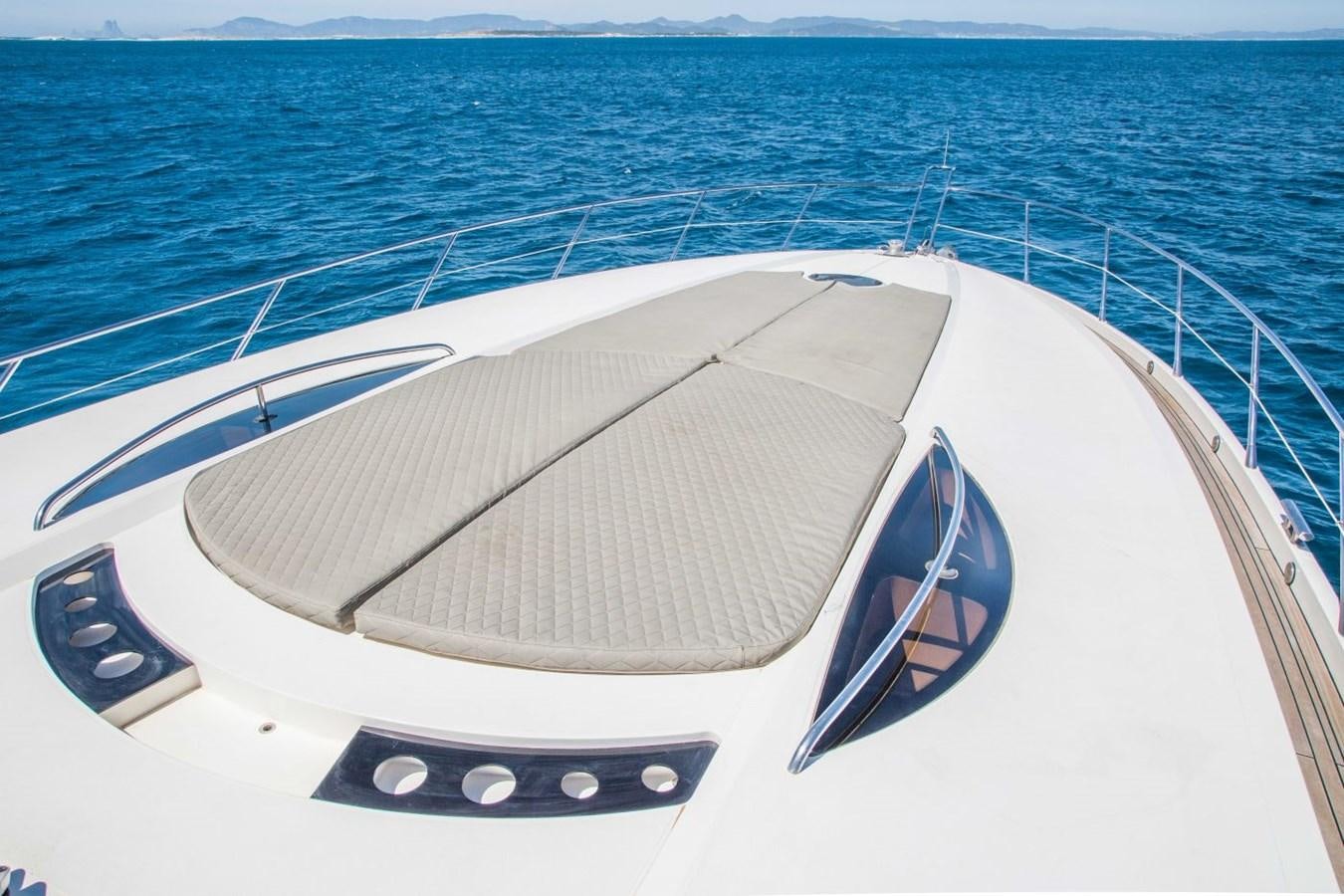 a white boat on the water aboard LE CHIFFRE Yacht for Sale