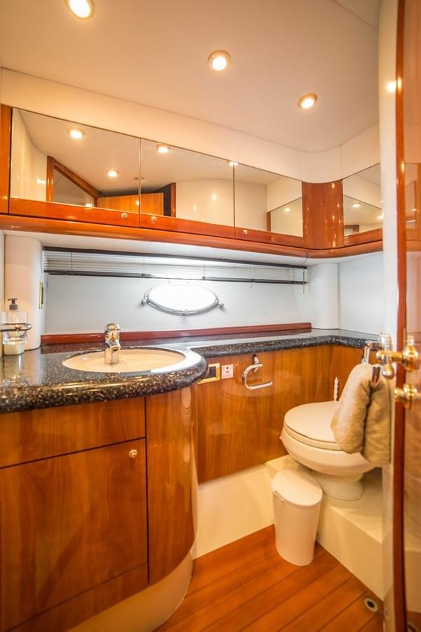 a bathroom with a sink and a toilet aboard LE CHIFFRE Yacht for Sale