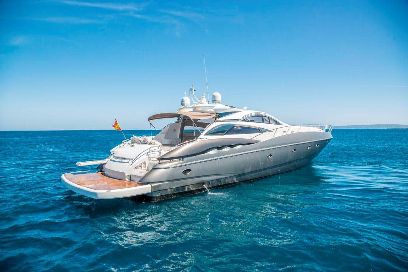 a white yacht in the water aboard LE CHIFFRE Yacht for Sale