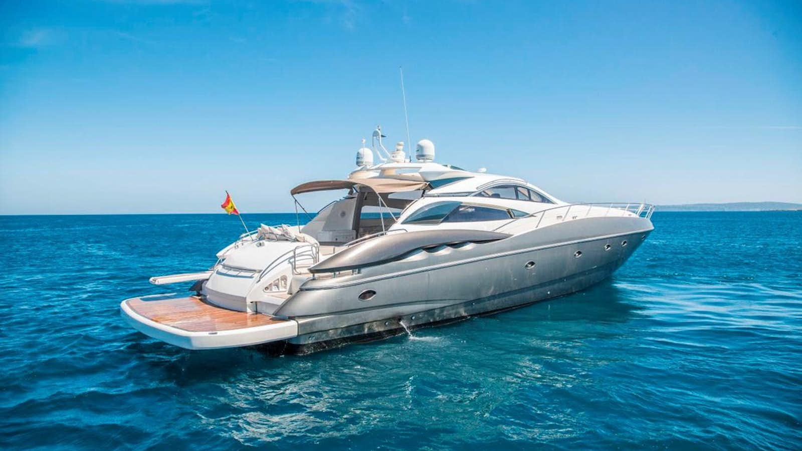 a white yacht in the water aboard LE CHIFFRE Yacht for Sale